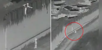 Captan el instante en que un hombre lanza a un niño sobre el muro fronterizo entre México y EE. UU. Captan el instante en que un hombre lanza a un niño sobre el muro fronterizo entre México y EE. UU.
