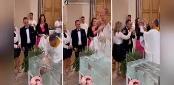 ¿Preparándolo para las Olimpiadas?: sacerdote genera críticas por singular forma de bautizar a bebé ¿Preparándolo para las Olimpiadas?: sacerdote genera críticas por singular forma de bautizar a bebé