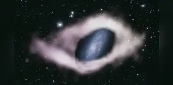Astrónomos hallan misteriosa galaxia envuelta, como regalo, en una cinta cósmica