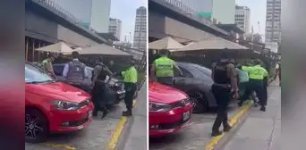 El instante en que la policía rompe las lunas del auto del hombre que asesinó a mujer en Miraflores