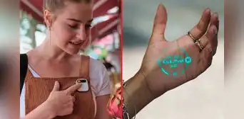 ¿Adiós a los celulares? Crean pin que toma fotos, graba videos y proyecta la pantalla en tu mano