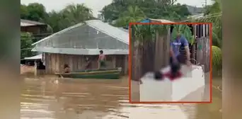 Niños usan refrigeradora para transportarse en inundaciones tras 11 horas de lluvia en Loreto
