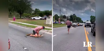 Captan instante en el que hombre se enfrenta 'sin ayuda' a un caimán en una calle de Estados Unidos