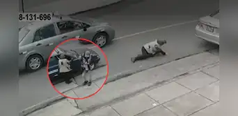 Pueblo Libre: delincuente finge comprar dólares para asaltar a cambista y la arrastra por la pista