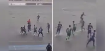 Liga 2: jugadores disputan un partido en medio de una cancha inundada por fuertes lluvias