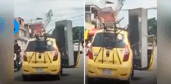 Taxista genera críticas al llevar una refrigeradora y mecedoras en su vehículo: “Irresponsable al volante” Taxista genera críticas al llevar una refrigeradora y mecedoras en su vehículo: “Irresponsable al volante”
