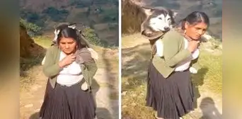 Adulta mayor lleva cargado en su espalda a su perro enfermo hasta la ciudad en busca de veterinario