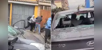 Vecinos golpean y destruyen auto de pareja que intentó estafar a comerciante con falso Yape en Los Olivos Vecinos golpean y destruyen auto de pareja que intentó estafar a comerciante con falso Yape en Los Olivos