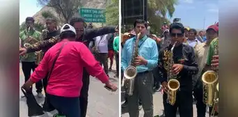Orquesta musical realizó show en plena carretera para cruzar vía bloqueada: “Todo sea por pasar”