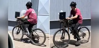 Joven convierte su bicicleta en oficina móvil y sorprende con su insólita modalidad de teletrabajo Joven convierte su bicicleta en oficina móvil y sorprende con su insólita modalidad de teletrabajo