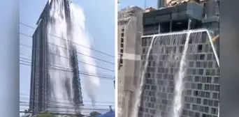 El agua de una piscina en azotea inunda las calles de Bangkok al quebrarse durante el terremoto en Tailandia El agua de una piscina en azotea inunda las calles de Bangkok al quebrarse durante el terremoto en Tailandia