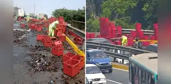 Decenas de cajas de cerveza quedan regadas en la Vía de Evitamiento tras accidente de camión de carga Decenas de cajas de cerveza quedan regadas en la Vía de Evitamiento tras accidente de camión de carga