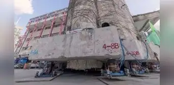 Robots mueven un barrio entero de 7.500 toneladas con una superficie de 4.030 metros cuadrados y se convierte en el traslado más grande de la historia de China