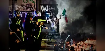 Policía de Los Ángeles arresta a casi 200 manifestantes durante toque de queda por las protestas contra redadas de ICE Policía de Los Ángeles arresta a casi 200 manifestantes durante toque de queda por las protestas contra redadas de ICE