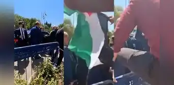 Hombre con la bandera de Palestina intentó agredir a Javier Milei mientras se dirigía a un evento en Israel Hombre con la bandera de Palestina intentó agredir a Javier Milei mientras se dirigía a un evento en Israel