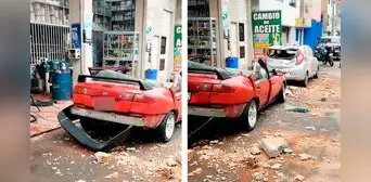 Bloques de ladrillos aplastan vehículos estacionados en calle de Independencia durante temblor de 6,1 que sacudió Lima y Callao Bloques de ladrillos aplastan vehículos estacionados en calle de Independencia durante temblor de 6,1 que sacudió Lima y Callao