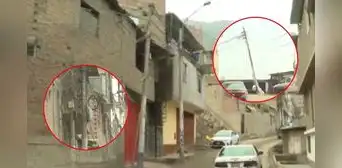 Rímac: vecinos construyen casa con poste de luz dentro y provocan que otro esté a punto de caer por mala instalación