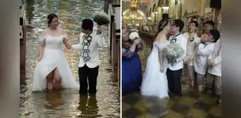 Pareja en Filipinas contrajo matrimonio en una iglesia inundada por las lluvias del tifón Whipa: "Es un sacrificio"