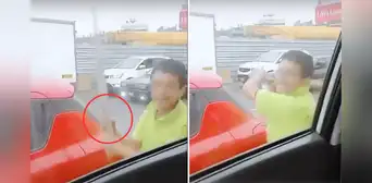 Con palo en mano, presunto chofer de bus destroza ventana de colectivero tras choque en Ventanilla Con palo en mano, presunto chofer de bus destroza ventana de colectivero tras choque en Ventanilla