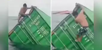 Pescador en Callao se sube a contenedor que cayó al mar peruano para sacar artículos y en redes dicen: "Quería saber qué venía en las cajas" Pescador en Callao se sube a contenedor que cayó al mar peruano para sacar artículos y en redes dicen: "Quería saber qué venía en las cajas"