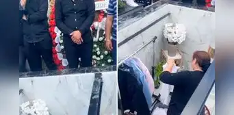Mujer cuelga ropa de su familiar fallecido en curiosa tumba con vidros de cristal: “¿Es sepelio o mudanza?”