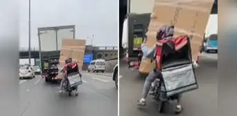 Delivery sorprende al trasladar un televisor en su motocicleta y usuarios bromean: "Servicio premium"