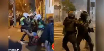 Policías fueron grabados apuntando y agrediendo a manifestantes durante la marcha del 15 de octubre Policías fueron grabados apuntando y agrediendo a manifestantes durante la marcha del 15 de octubre