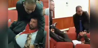 Exdecano del Colegio de Economistas es retirado a la fuerza, cargado de pies y manos, por personal de seguridad durante asamblea Exdecano del Colegio de Economistas es retirado a la fuerza, cargado de pies y manos, por personal de seguridad durante asamblea
