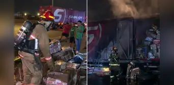 Los Olivos: fuerte incendio consume camión de encomiendas de Shalom en plena Panamericana Norte Los Olivos: fuerte incendio consume camión de encomiendas de Shalom en plena Panamericana Norte