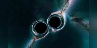 Dos agujeros negros supermasivos se acercarían a una colisión dentro de 100 años y la Tierra sentiría sus efectos Dos agujeros negros supermasivos se acercarían a una colisión dentro de 100 años y la Tierra sentiría sus efectos