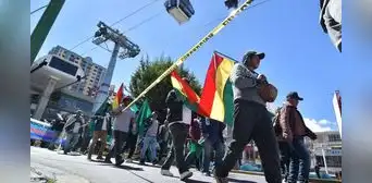 Cientos llegan a La Paz tras 28 días de marcha para exigir al gobierno boliviano anular reforma de ley agraria