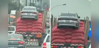 Insólito: captan camión trasladando automóvil encima de costales de cebolla en plena Panamericana Norte