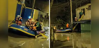 Rescatistas usaron botes inflables para evacuar a vecinos atrapados por lluvias intensas en Villa El Salvador