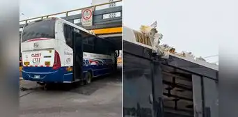 Bus de la empresa CTI queda atrapado bajo puente de avenida Brasil: desinflaron las llantas para liberar el vehículo Bus de la empresa CTI queda atrapado bajo puente de avenida Brasil: desinflaron las llantas para liberar el vehículo