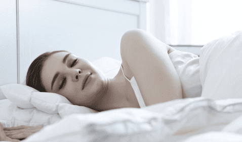 Establishing healthy sleep habits, such as having a regular bedtime, helps prevent insomnia