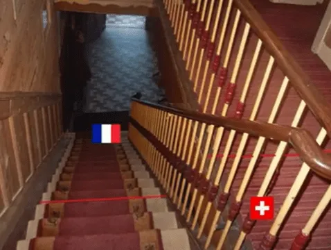 The staircase that divides the Hotel Arbez between France and Switzerland.  Photo: Courtesy Boundaries   