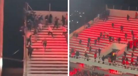 Hincha de la U. de Chile cayó al vacío desde la tribuna tras ataque de barristas de Independiente en partido de Copa Sudamericana