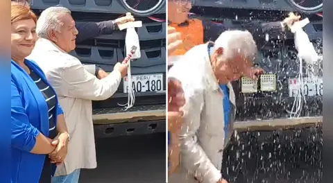 Cesar Acuña rompe botella en entrega de camiones, pero champán le empapó la cara y redes ironizan: “¿Así se inaugura ahora?”
