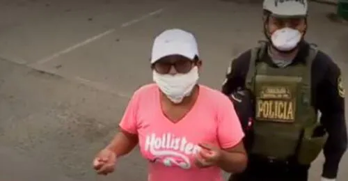 Detienen a dos mujeres que salieron a las calles en día que solo deben circular varones. Créditos: Captura América Televisión.