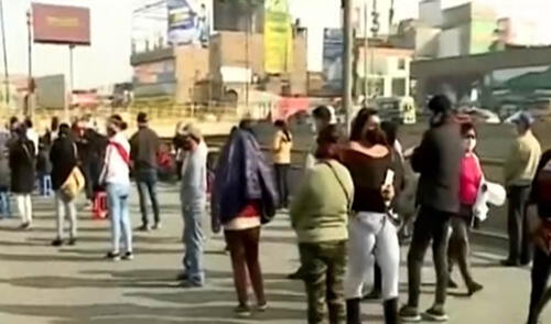 Ciudadanos acudieron a recoger el Segundo Bono Familiar con las medidas de bioseguridad. Foto: captura de América