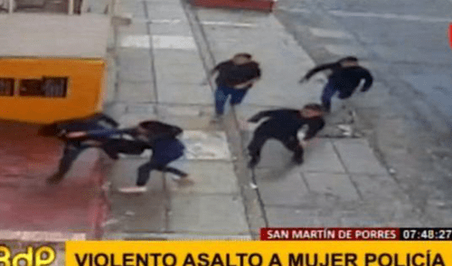 SMP: delincuentes arrastran a mujer policía para robarle su cartera [VIDEO]