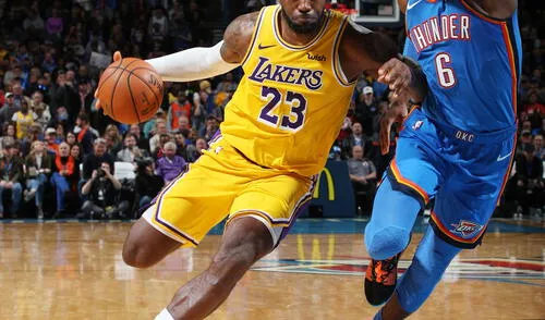 OKLAHOMA CITY, OK- NOVEMBER 22: LeBron James #23 of the Los Angeles Lakers drives to the basket during a game against the Oklahoma City Thunder on November 22, 2019 at Chesapeake Energy Arena in Oklahoma City, Oklahoma. NOTE TO USER: User expressly acknowledges and agrees that, by downloading and or using this photograph, User is consenting to the terms and conditions of the Getty Images License Agreement. Mandatory Copyright Notice: Copyright 2019 NBAE Zach Beeker/NBAE via Getty Images/AFP Los Angeles Lakers vs Oklahoma City Thunder