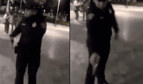 Perro ladra a policía y este le apunta con su arma