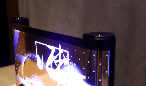 Así funciona el mecanimo enrollable del futuro teléfono de TCL. Foto: YouTube Gigante asiático revela smartphone con pantalla enrollable