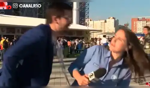 YouTube viral: intenta robarle un beso a periodista y ella reacciona así [VIDEO]