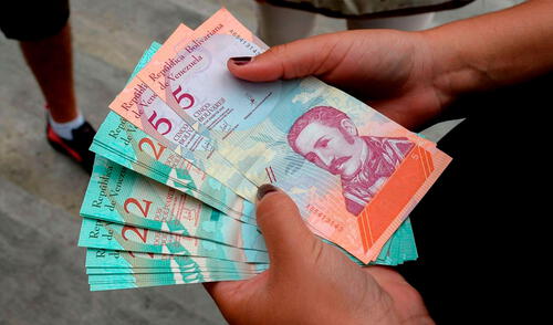 El BCV agregó que "el tipo de cambio de referencia seguirá siendo el que determine el sistema de mercado cambiario venezolano". Foto: AFP El BCV agregó que "el tipo de cambio de referencia seguirá siendo el que determine el sistema de mercado cambiario venezolano". Foto: AFP