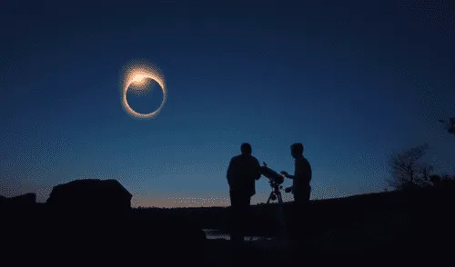 Aficionados a la astronomía observan con un telescopio un eclipse solar. Foto: captura de Youtube / EarthSky Aficionados a la astronomía observan con un telescopio un eclipse solar. Foto: captura de Youtube / EarthSky