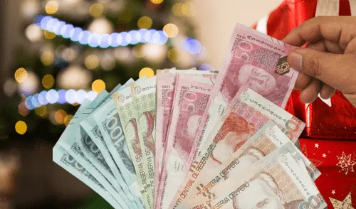 Billetes peruanos, regalo de navidad y árbol de navidad