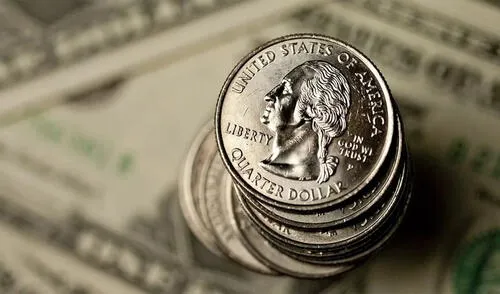 El diseño único de la moneda de 25 centavos de 1964, con el rostro de George Washington y un águila en el reverso