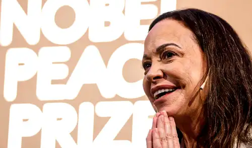 Machado también aprovechó para agradecer a las “mujeres y hombres” que se arriesgaron para que ella pudiera llegar a Oslo. Foto: AFP María Corina Machado advierte que Venezuela fue "invadida" por grupos que lo convirtieron en “el centro del crimen” en América